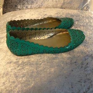 Green and gold Coach flats